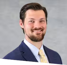 A headshot of Dr. Joshua Burka